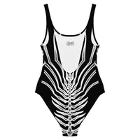 Product image for the back of a one-piece swimsuit featuring Finfolk's Dead Men Tell No Tails mermaid tail design.